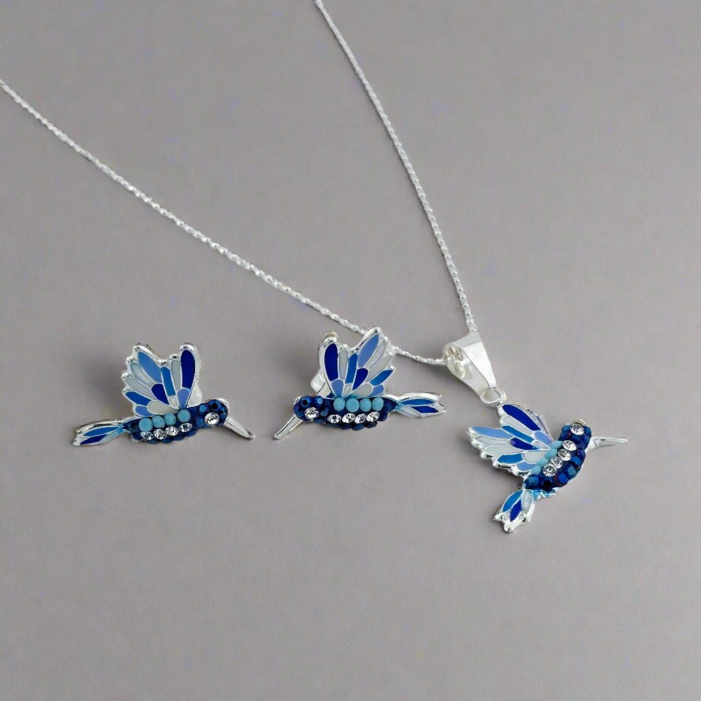 hummingbirds set in blue