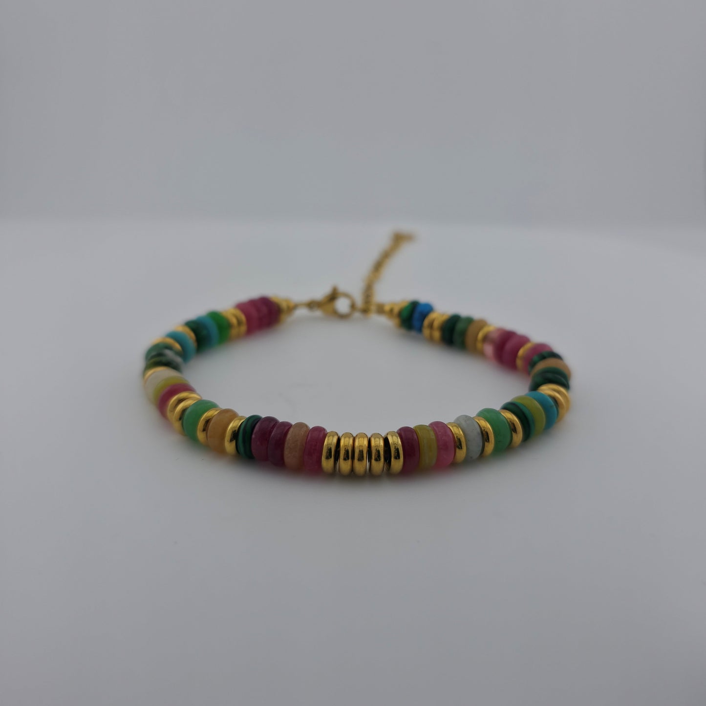 Multicolored beaded bracelet on a white background