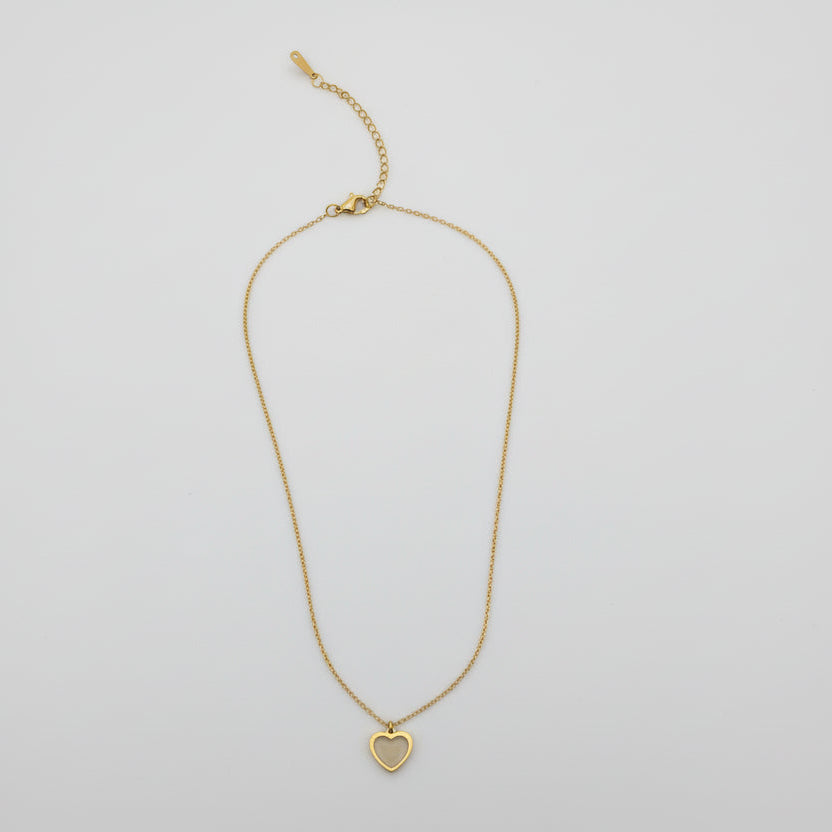 Gold necklace on a white background