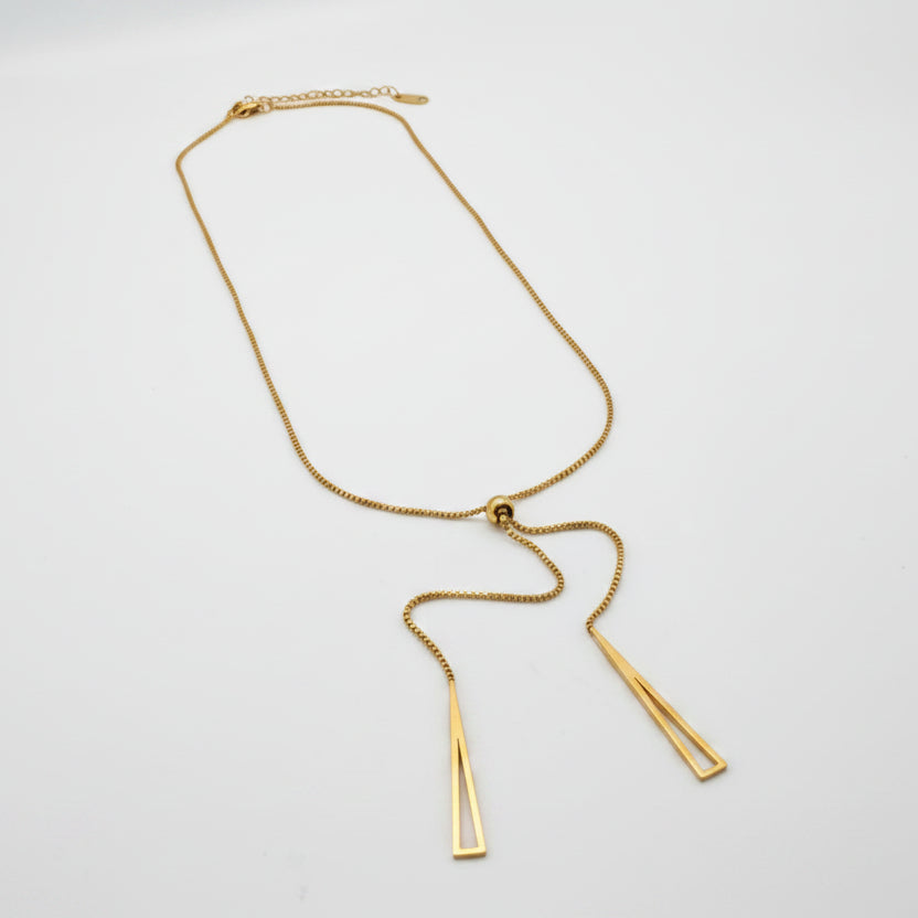 Gold necklace on a white background