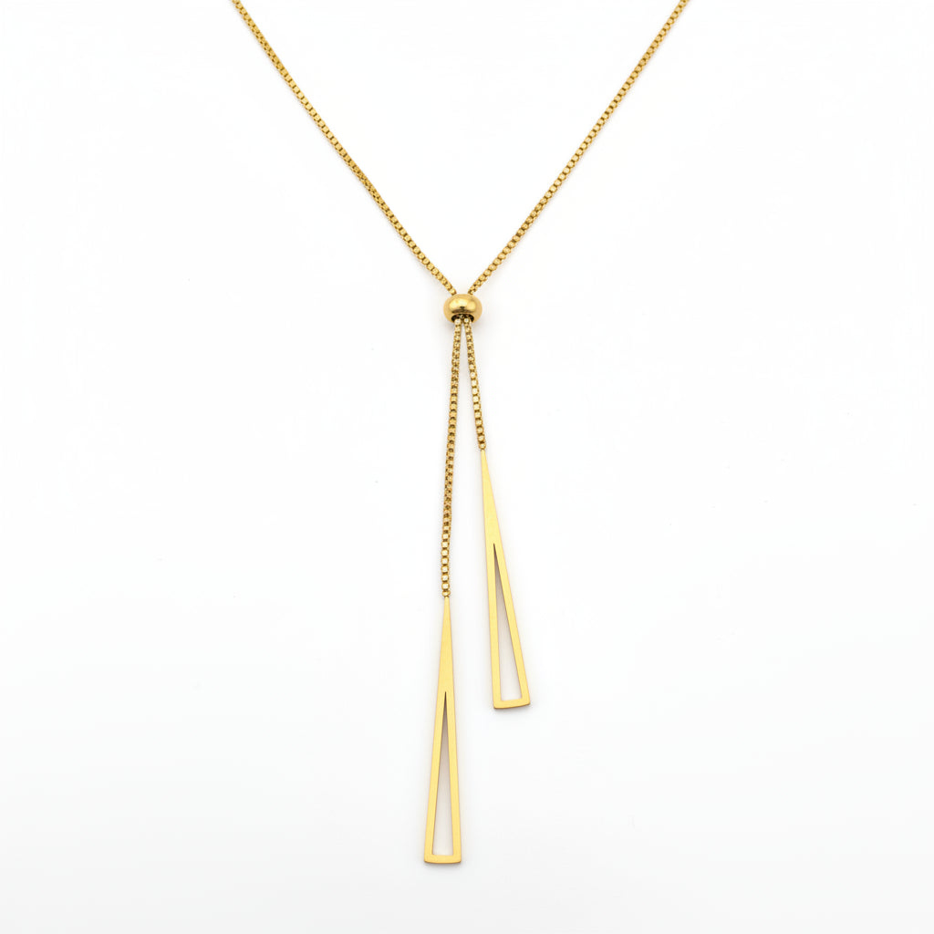 Gold necklace on a white square base with a light gray background