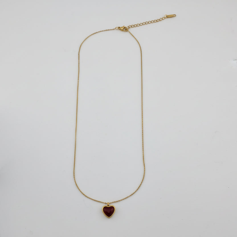 Gold necklace on a white background