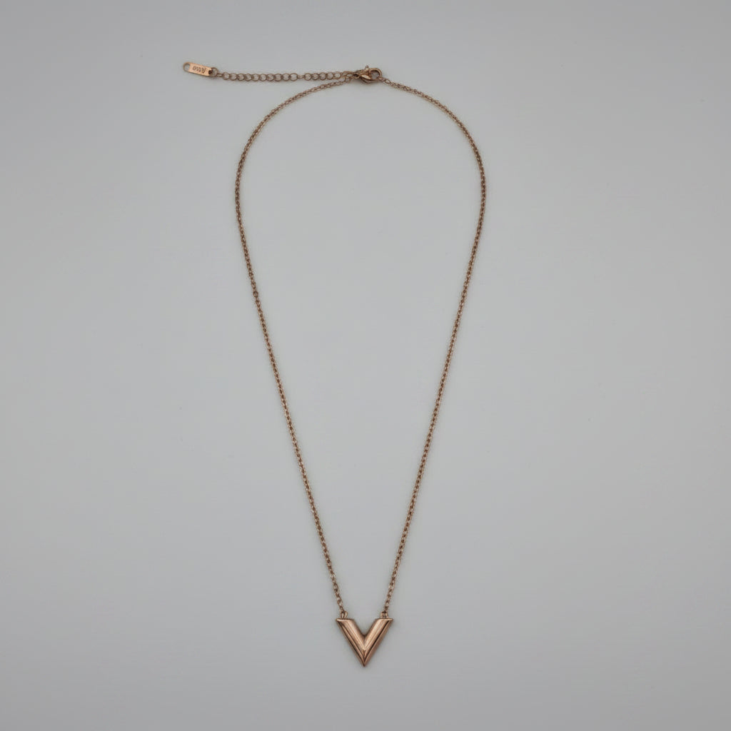 Rose Gold necklace on a light gray background